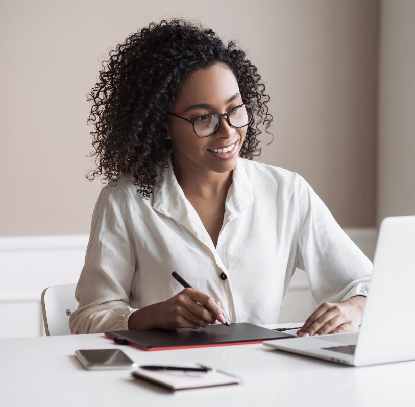 A woman uses a laptop computer